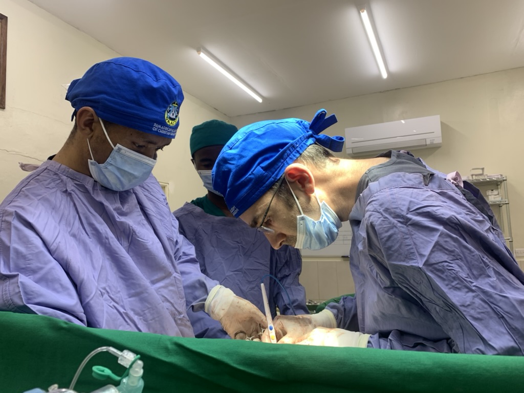 medical workers perform a surgery in Madagascar